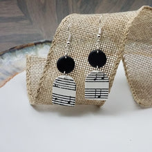 Load image into Gallery viewer, Solid Black Circle with White Arch Shaped Music Notes Dangle Handmade Earrings