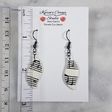 Load image into Gallery viewer, White Leaf Shaped Music Notes Dangle Earrings
