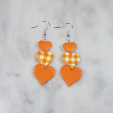 Load image into Gallery viewer, Small, Medium, Large Heart Plaid and Orange Dangle Earrings
