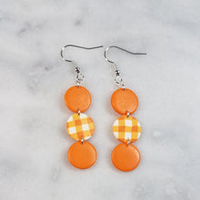 Load image into Gallery viewer, Triple Circle Orange and Plaid Dangle Earrings
