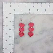 Load image into Gallery viewer, Triple Heart Shaped Shiny Red Handmade Dangle Earrings

