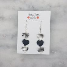 Load image into Gallery viewer, White With Black Heart Triple Small Heart Shaped Music Notes Dangle Earrings
