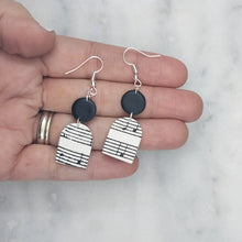 Load image into Gallery viewer, Solid Black Circle with White Arch Shaped Music Notes Dangle Earrings
