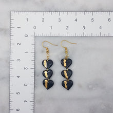 Load image into Gallery viewer, Small Triple Heart Shaped Black With Gold Stripe Handmade Dangle Earrings
