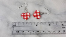 Load image into Gallery viewer, Red and White Buffalo Plaid Polymer Clay Heart Valentines Dangle Earrings
